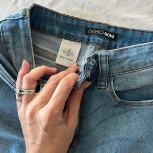 Blue knee ripped jeans